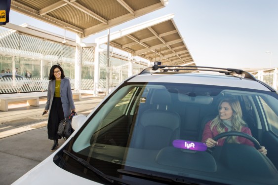 Lyft car picking up rider